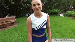 busty cheerleader flashing her boobs outdoors, wanna see more?