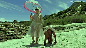 Dominatrix Mistress April runs a kinky game show with bound blonde slaves