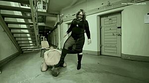 Dominatrix Mistress April runs a kinky game show with bound blonde slaves