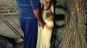 brother-in-law and sister-in-law enjoy a private moment outside the house