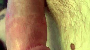 Feeling the intense pleasure of a sexy handjob on my monster cock up close.