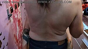 barber babe flaunts her perfect natural tits while teasing the customer