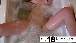 Babe boldly masturbates to orgasm in bath