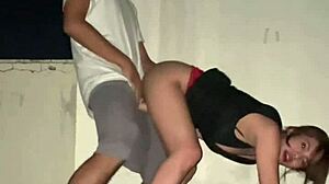 She got slammed hard atop a building in broad daylight