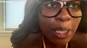 Hazelnutxxx smears her ebony face with cum in a bikini