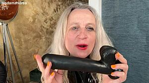 Fisting in the ass with a mega dildo, latex corset, and prolapse