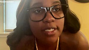 Hazelnutxxx smears her ebony face with cum in a bikini