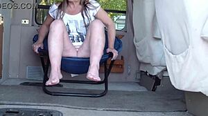 some guy's wife flashes on the beach outdoors