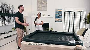 The masseuse's sensual touch on her oiled big ass and tits drives her wild during the erotic massage