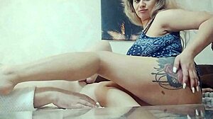 that soft dick turns hard under the blonde's skilled handjob with white nails