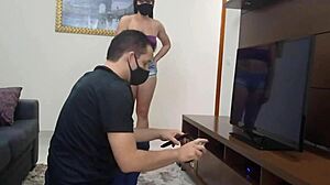 Curvy barefoot housewife teases TV technician with short shorts, exposing shaved pussy and natural tits