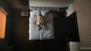 Watch her skinny body with small tits masturbating solo on the bed in this hidden cam view!