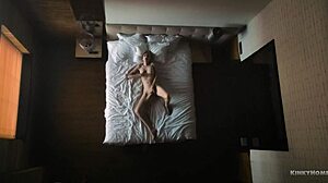 Watch her skinny body with small tits masturbating solo on the bed in this hidden cam view!