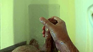 She masturbates in the shower at home