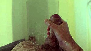 She masturbates in the shower at home