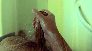 She masturbates in the shower at home