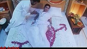 Erotic scene unfolds on first night.