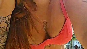 African woman flashing on the beach