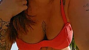 African woman flashing on the beach