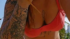 African woman flashing on the beach