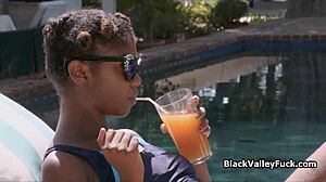 Nubian princess blows big white dick by pool