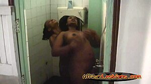 Two horny african lesbians play under the shower