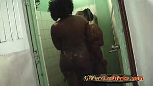 Two horny african lesbians play under the shower