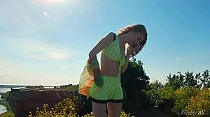 Beautiful blonde teen 18+ model gets naked outdoors showing pussy