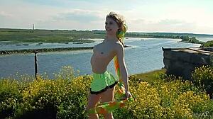 Beautiful blonde teen 18+ model gets naked outdoors showing pussy