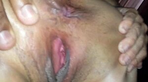 I'm playing with the skinny old lady's pussy up close