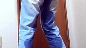 A girl wets her jeans while waiting for the bathroom her brother is using