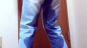 A girl wets her jeans while waiting for the bathroom her brother is using