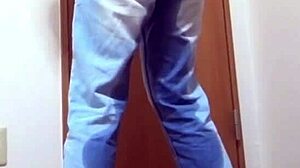 A girl wets her jeans while waiting for the bathroom her brother is using