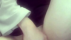 Amateur massages her hot wet pussy with big tits exposed.