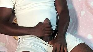 Ebony Milf Gives Sloppy Handjob To Big Black Cock. She Plays With Shaved Pussy And Ass.