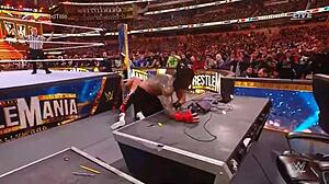 Roman reigns dominates cody rhodes in intense undisputed wwe universal championship match at wrestlemania 39