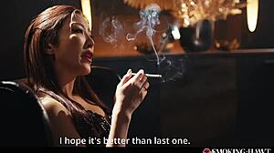 This Japanese babe was smoking a cigarette while blowing smoke on a thick cock during dirty talk