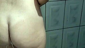 Young amateur lesbian teases her ass and pussy in the shower, ready for fucking?