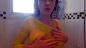 Is this naughty Latina masturbating in the shower, craving cock?