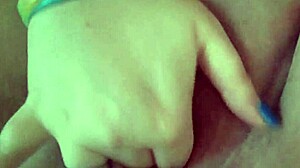 The chubby girl plays with her fat pussy