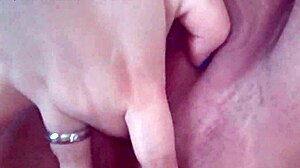 The chubby girl plays with her fat pussy