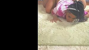 ali deepthroats big black cock with her natural tits bouncing.