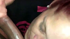 Sucking that big black monster cock.