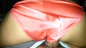 Watch this orange satin panty job, she says