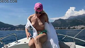 blonde rides topless on boat taxi, flashing big tits surprise for driver