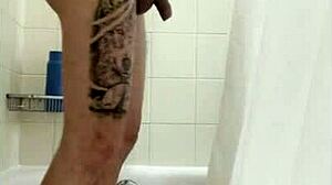 In the bath, pornstar gets groped and gives handjob.