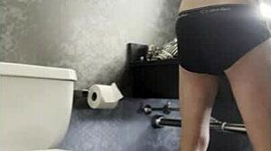 In the bath, pornstar gets groped and gives handjob.