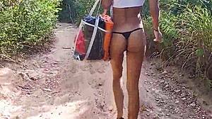 she strolled topless in a thong, flashing through the forest