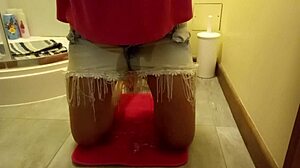 Sexy girl wets herself while masturbating in the toilet