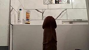 Brunette Stretches Pussy With Dildo